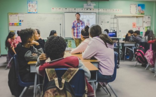 Primary children in a classroom session 